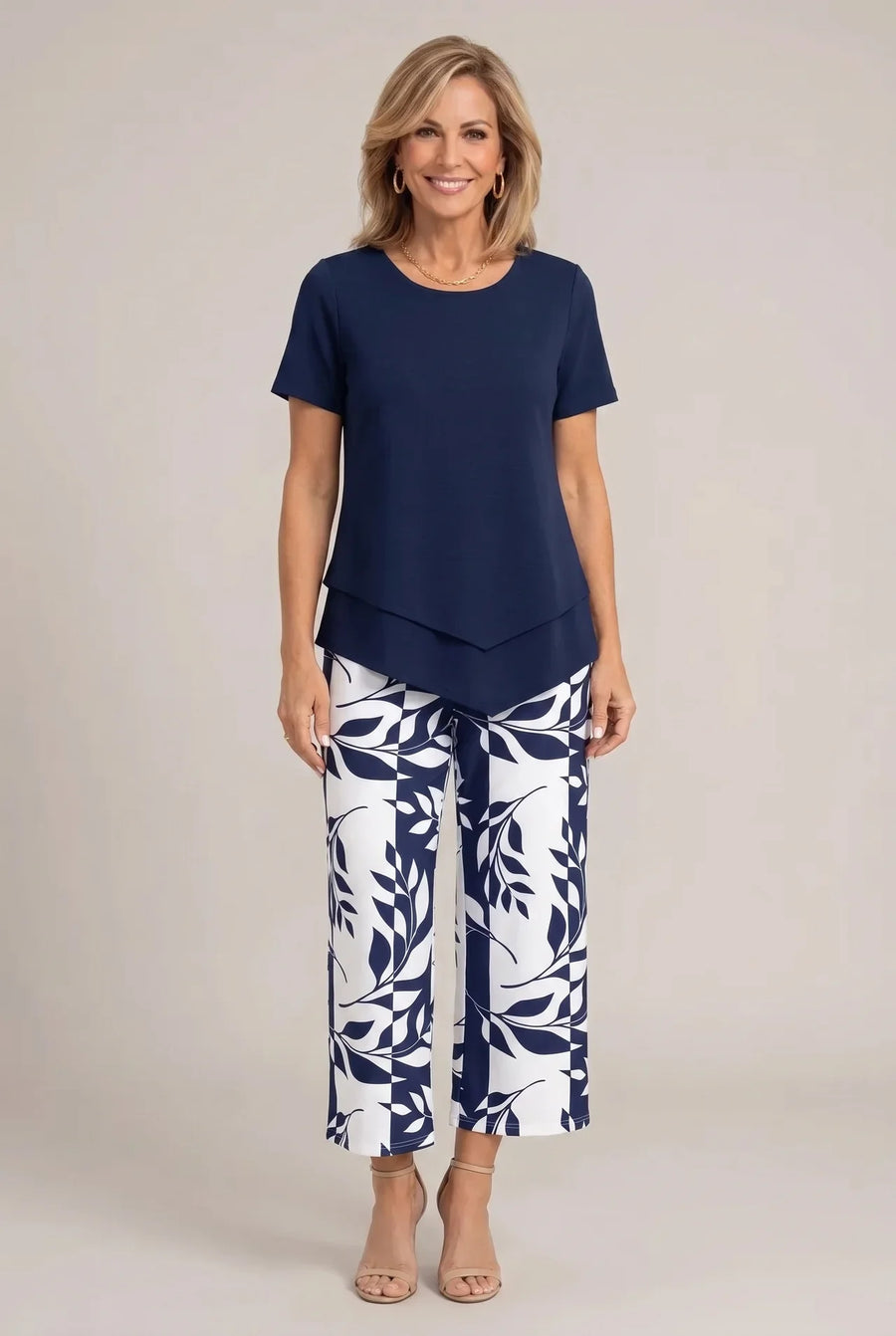 Navy peplum short-sleeve top and wide-leg trousers set with white leaf print