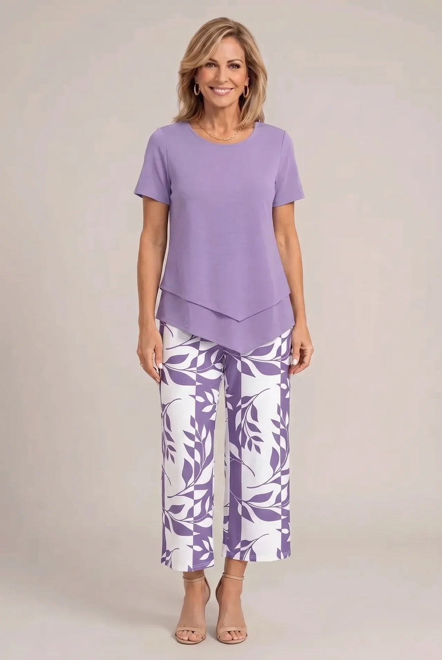 Purple tailored two-piece set with short-sleeve top and wide-leg patterned pants