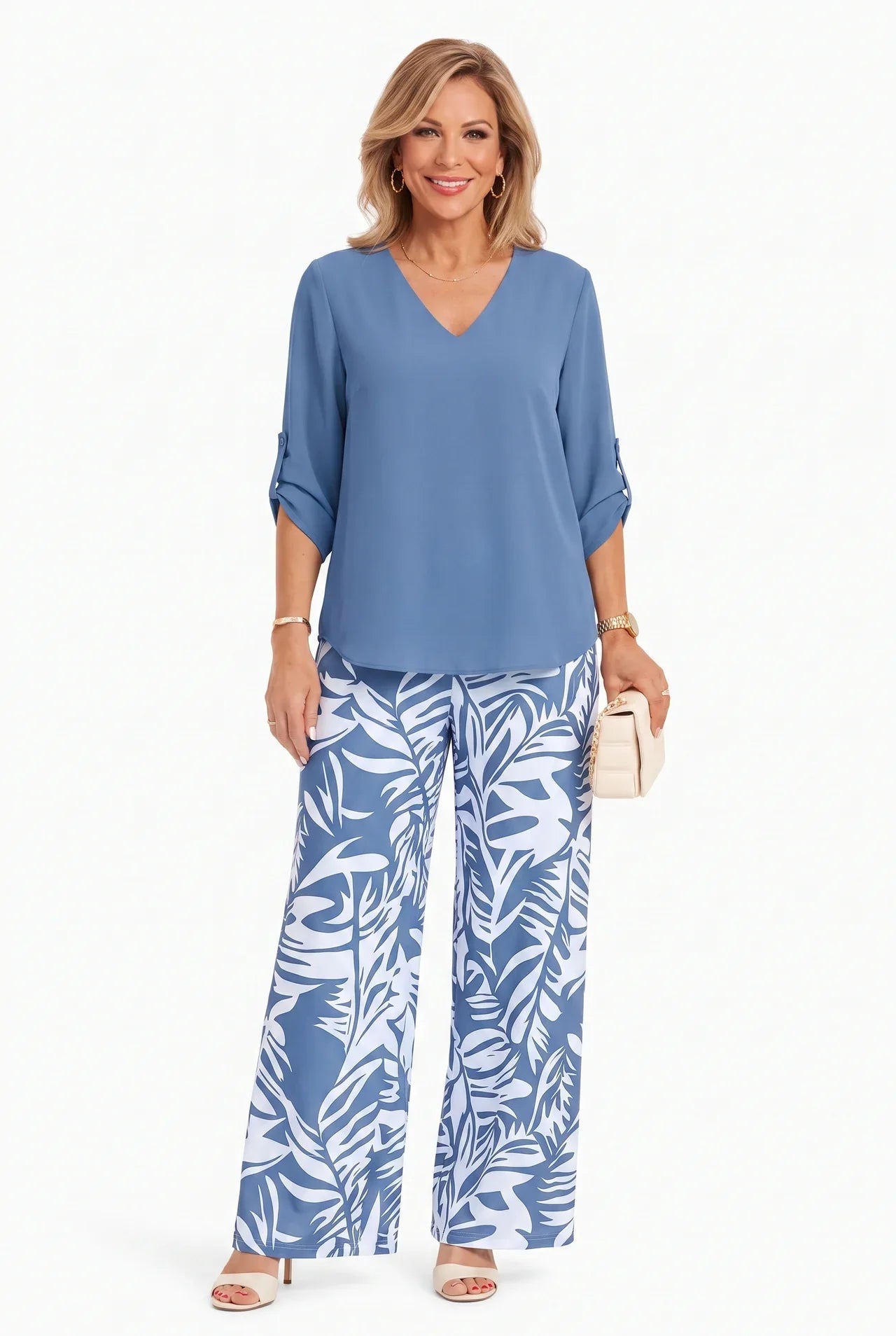 Blue V-neck top and wide-leg pants set with palm-leaf print