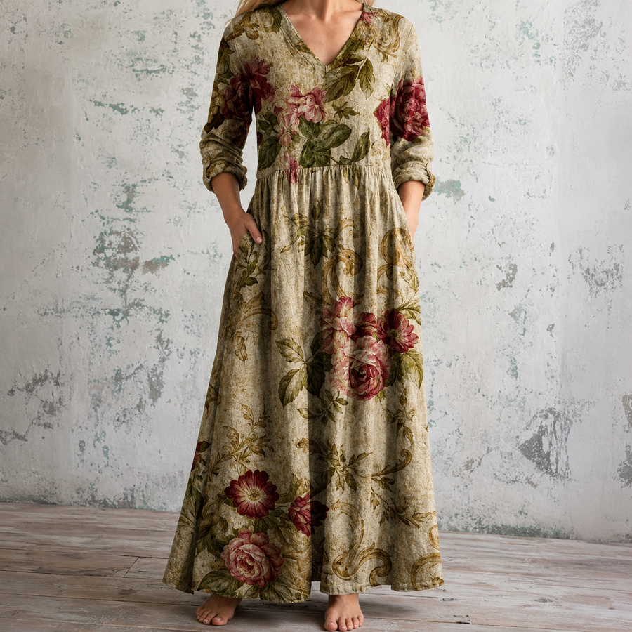 Floral summer dress with V-neck, 3/4 sleeves, and gathered waist in green tones