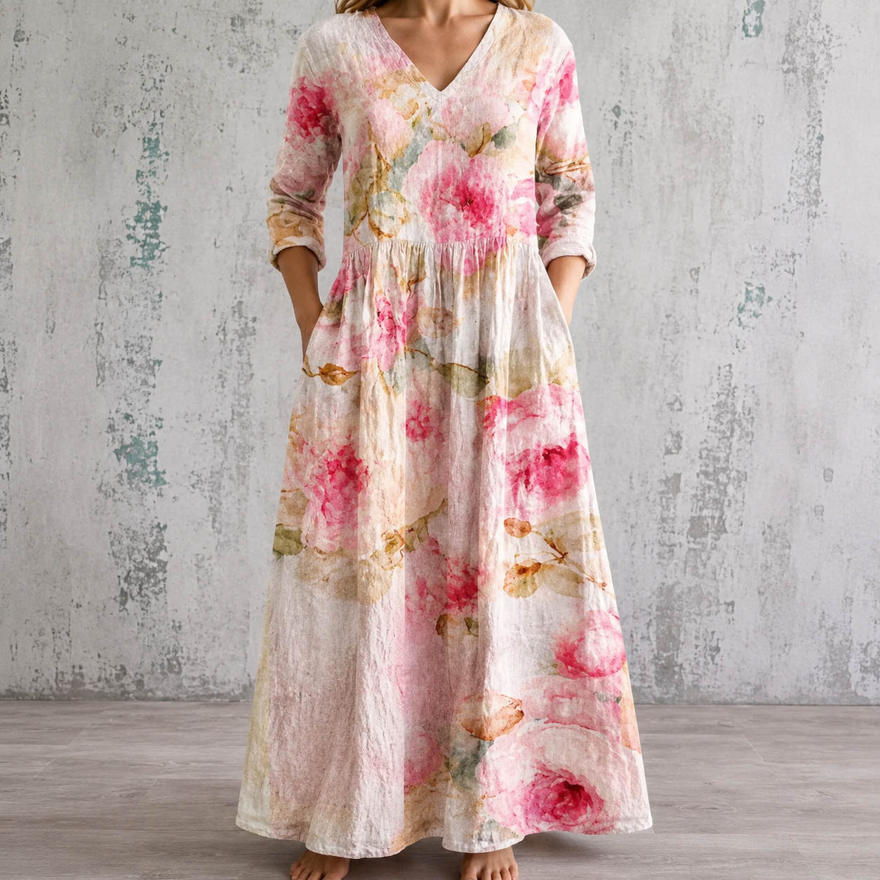 Floral summer dress with V-neck, gathered waist, and 3/4 sleeves in pink and cream