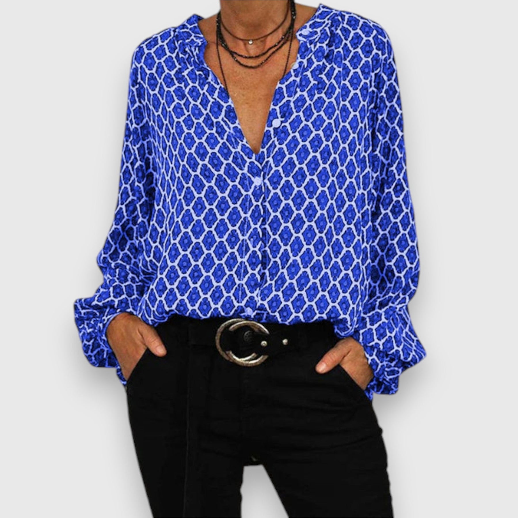 Long-sleeve blouse with blue-and-white geometric pattern, V-neck, relaxed fit