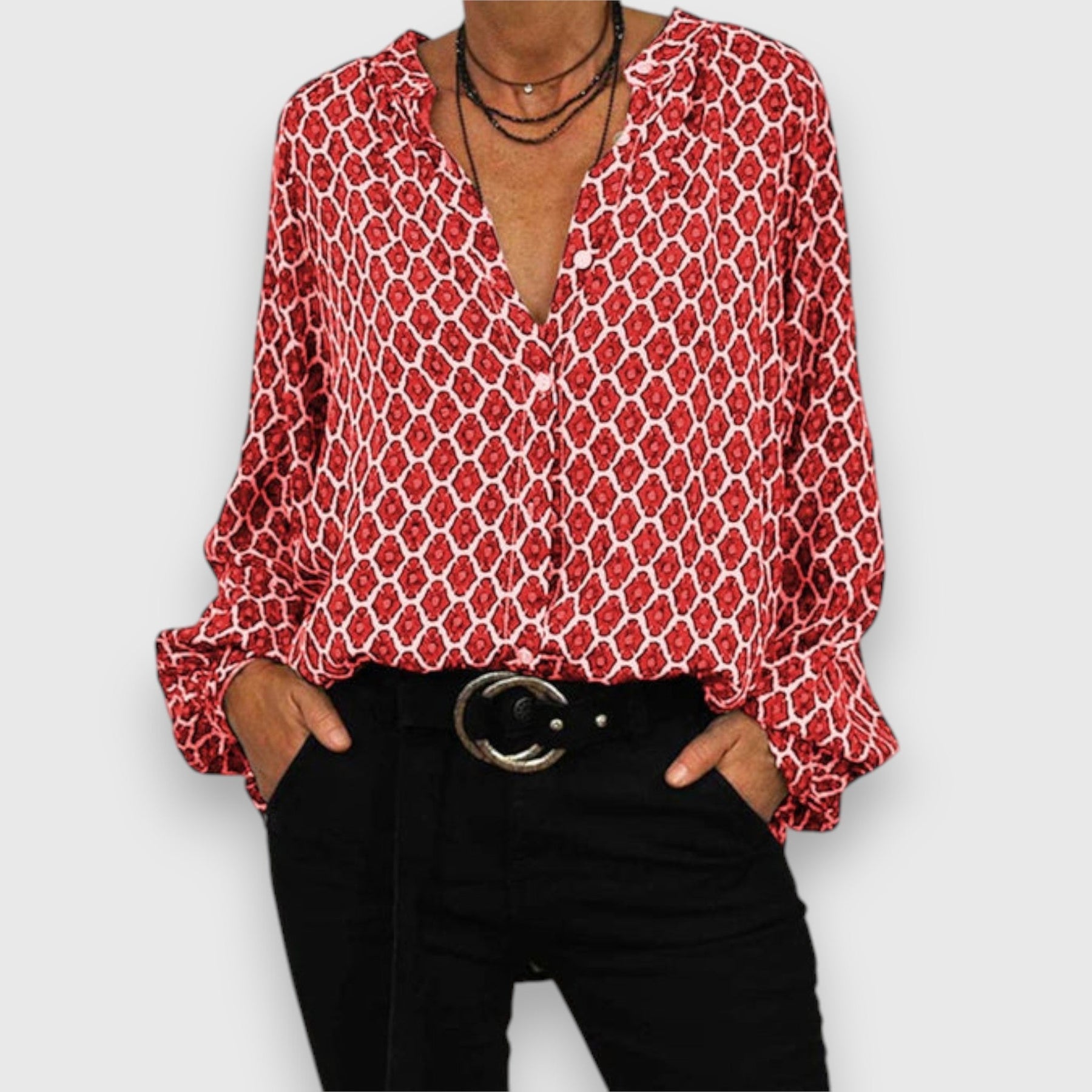 Long-sleeve blouse with red-and-white geometric pattern, V-neck, relaxed fit