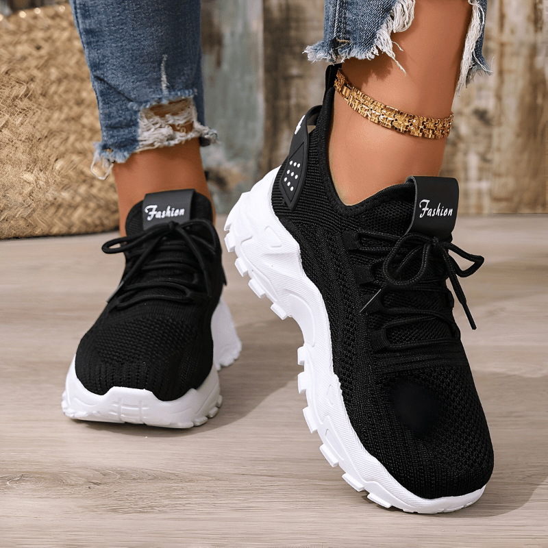Black knitted comfort sneakers, lace-up with cushioned collar and thick sole