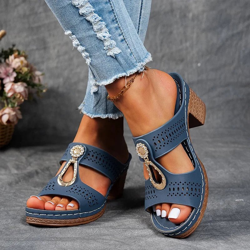 Navy perforated slide sandals with rhinestone charm and woven-look block heel