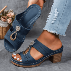 Blue perforated open-toe sandals with rhinestone O-ring strap detail and block heel