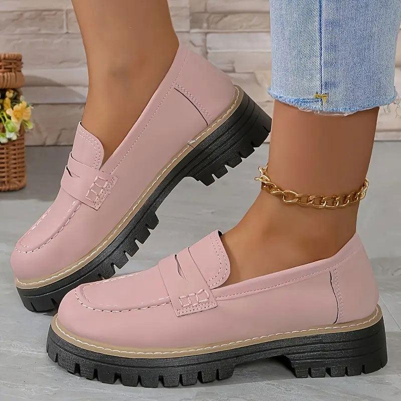 Pink comfort loafers with slip-on strap detail and chunky tread sole