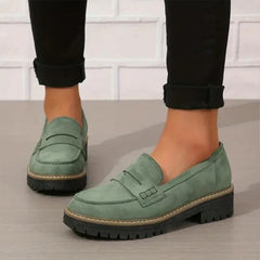 Green comfort loafers with slip-on strap detail and rugged lug sole