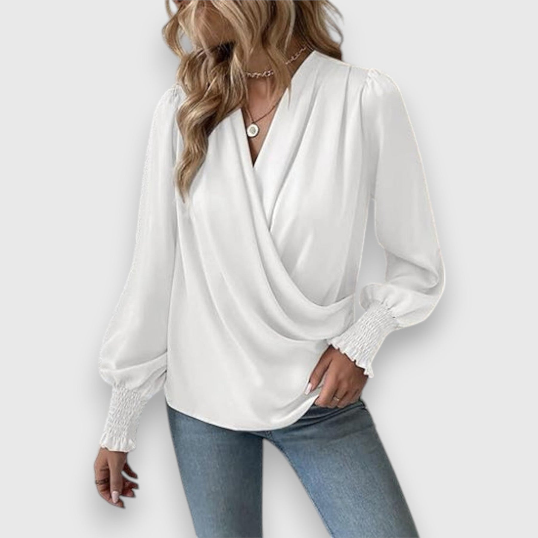 White long-sleeve satin blouse with draped cowl V-neck and elastic cuff details