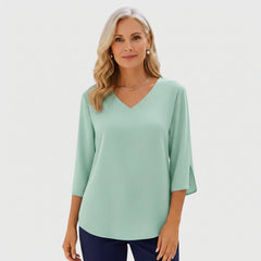Green V-neck elegant blouse with three-quarter sleeves and draped fit