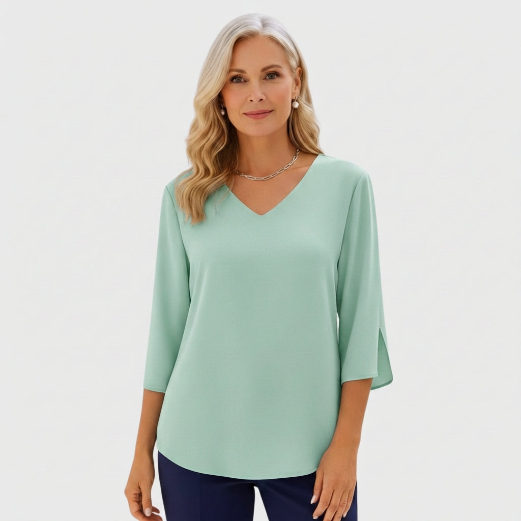 Green V-neck elegant blouse with three-quarter sleeves and draped fit