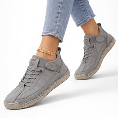 Grey lace-up comfort sneakers with side strap and textured rubber sole