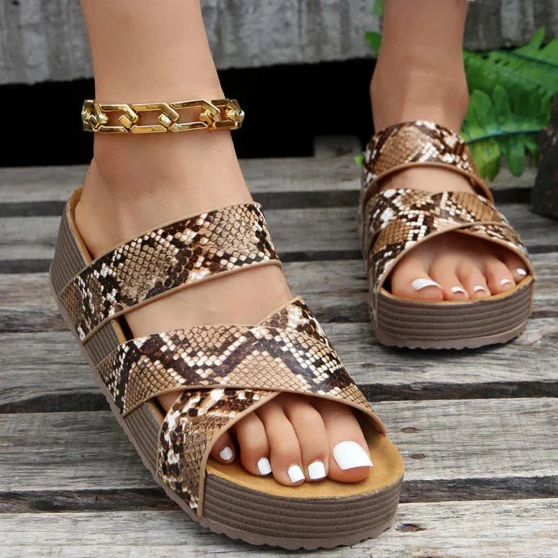 Ruby comfortable sandals in snake-pattern, crisscross straps, peep-toe platform sole