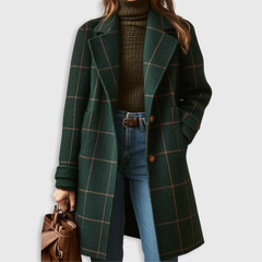 Dark green plaid long winter coat with button front, notch lapels, and side pockets