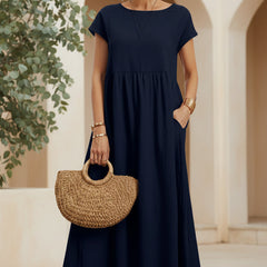 Navy blue casual midi dress with short sleeves and gathered waist