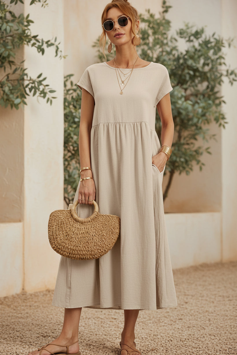 Off-white casual midi dress with short sleeves and gathered waist