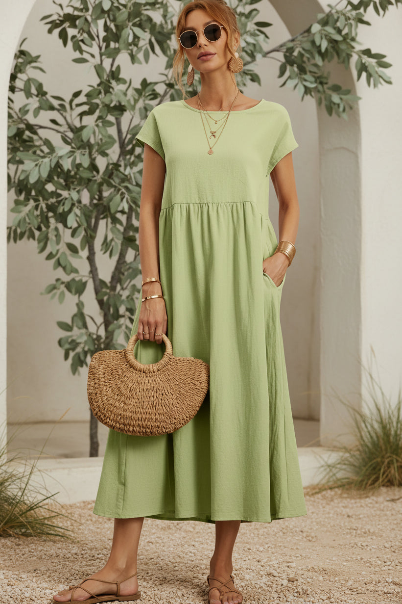 Soft green casual midi dress with short sleeves and gathered waist