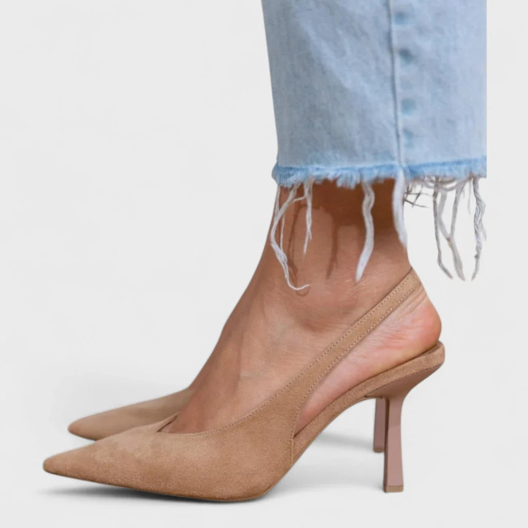 Beige suede slingback shoe detail: low stiletto heel and pointed toe