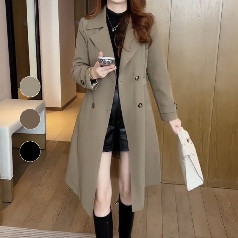 Khaki trench coat with double-breasted buttons, belt at waist, and long length